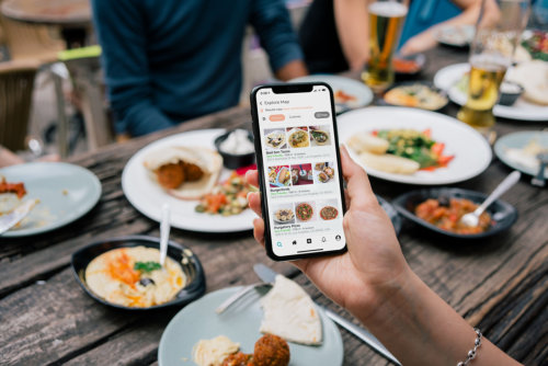 Woman is ordering food on her mobile