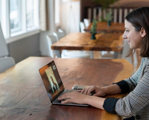 Woman talking on her laptop via zoom