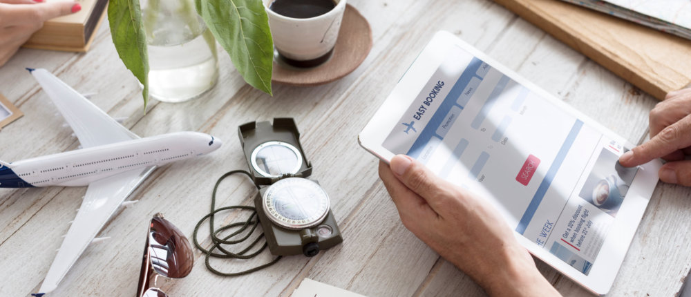 Person Booking Flight Online Concept